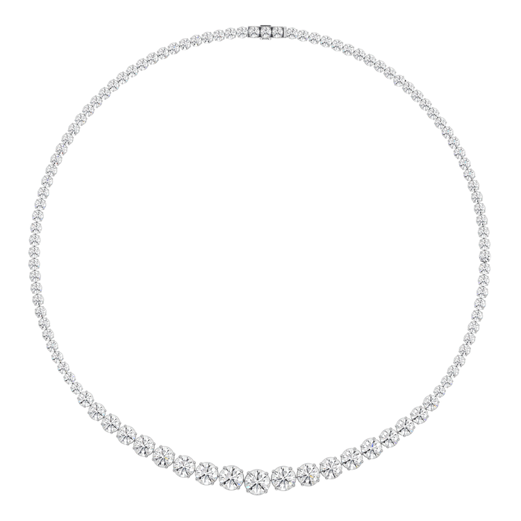This 25ct graduated diamond tennis necklace features flawless round brilliants in a four prong solitaire setting. Paired here with the Collier de Diamants - our uniform tennis necklace, for the ultimate stack. D-color, IF/VVS diamonds crescendo toward a center diamond of 1ct. The length of this striking piece is 16 inches (40cm).