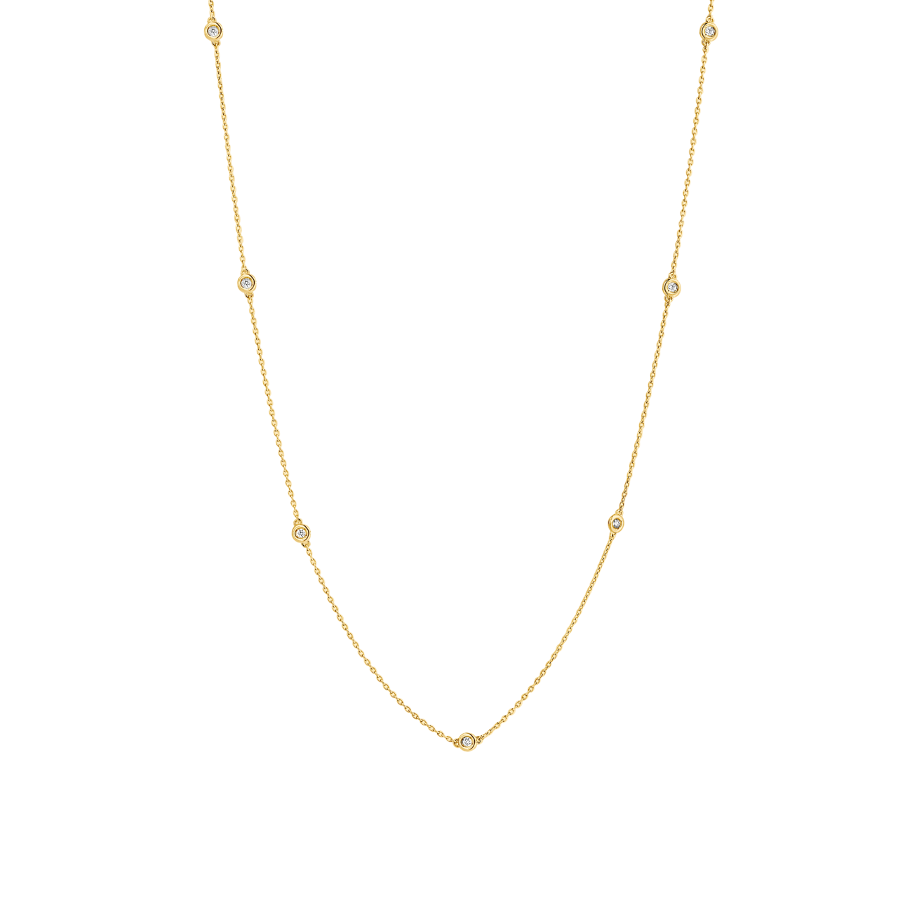 7 bezel-set round brilliants wrap around a 16" (40 cm) chain of recycled 18k Yellow Gold totaling 3.8 grams. Reach out to our Atelier to customize.