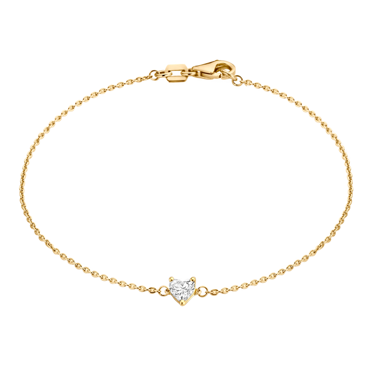 The Coup de Cœur bracelet features an 18K gold chain with a brilliant heart diamond. This diamond bracelet can be adjusted to two different lengths, 6.3" (16 cm) and 6.7" (17 cm).