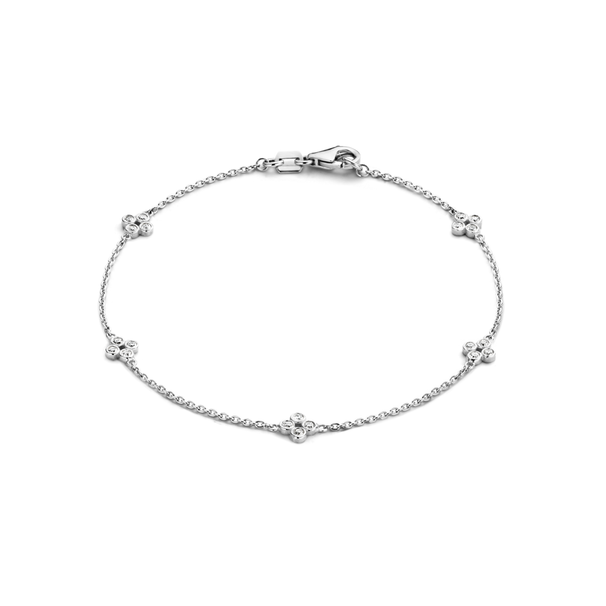 This delicate bracelet has 20 D color, IF/VVS clarity round brilliant diamonds that form sweet floral motifs around the wrist in 18k recycled gold. This bracelet can be adjusted to two different lengths, 6.3" (16 cm) and 6.7" (17 cm). Shown here in White Gold.
