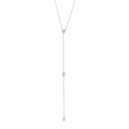 Three 0.25ct diamonds are strung along a 18k gold chain. Diamond shapes from top to bottom are: Round, Marquise, Pear. The collar of the necklace measures 16 inches (40cm); the length of the drop is 4 inches (10cm). To customize, please write to our Atelier. 18k White Gold shown here. Pair with the matching earrings in the Lariat collection.