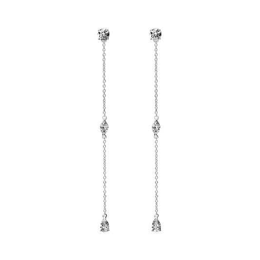 Full of movement, these hanging diamond Lariat earrings are strung with 6 brilliant diamonds totaling 1.2 carat, each of which is separated by 1 inch of recycled 18k gold. Pair with other pieces in the Lariat collection: Lariat Deux, and the Lariat necklace. Sold as a pair.