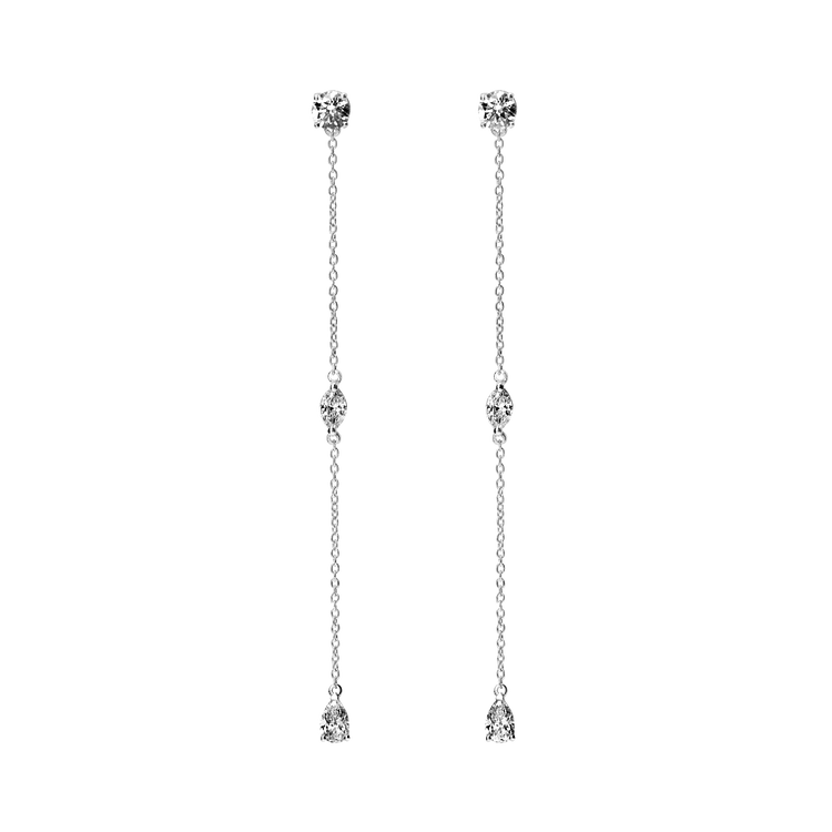 Full of movement, these hanging diamond Lariat earrings are strung with 6 brilliant diamonds totaling 1.2 carat, each of which is separated by 1 inch of recycled 18k gold. Pair with other pieces in the Lariat collection: Lariat Deux, and the Lariat necklace. Sold as a pair.