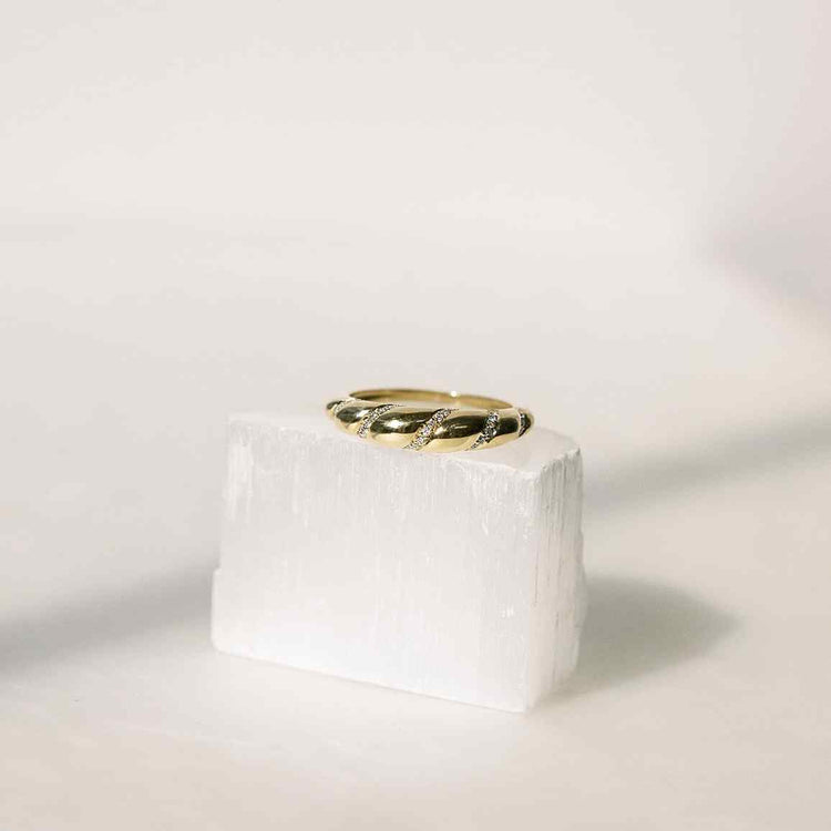 6 grams of voluminous 18K Yellow Gold with diamonds woven throughout form the celestial Lune ring. All diamonds are D color, IF/VVS clarity.