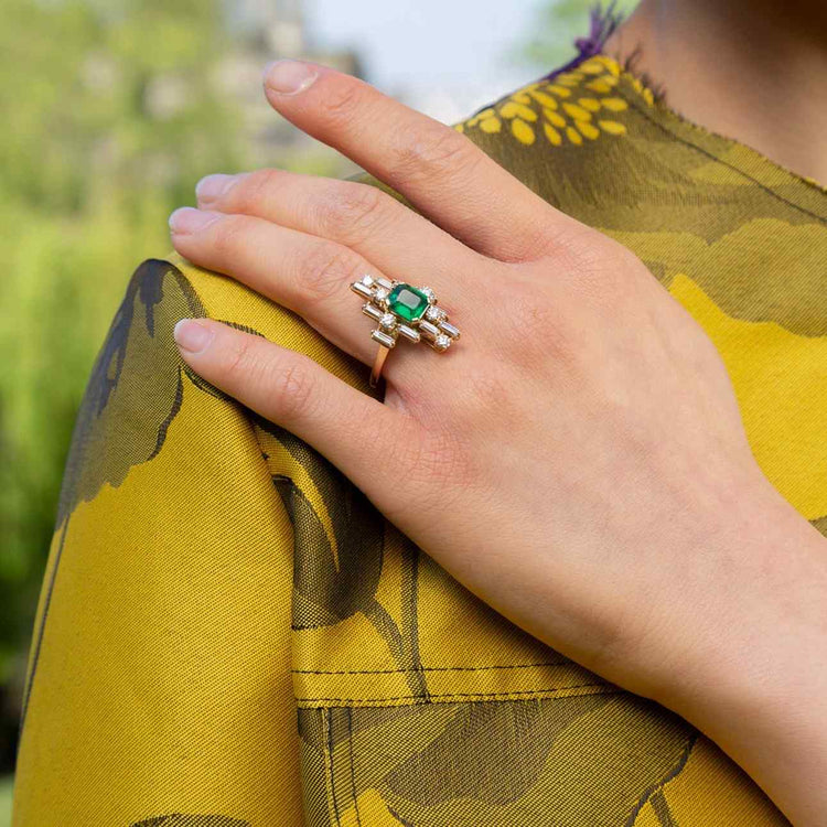 Inspired by the Art Deco period, this inimitable cocktail ring - the Nina - bespeaks the multilayered, dynamic, and playful era. Baguette and round diamonds are set in multidimensional space around an heirloom 2 carat Emerald. Connect with our Atelier's design experts to make yours to order and to customize the size, color, and gem of the center stone.