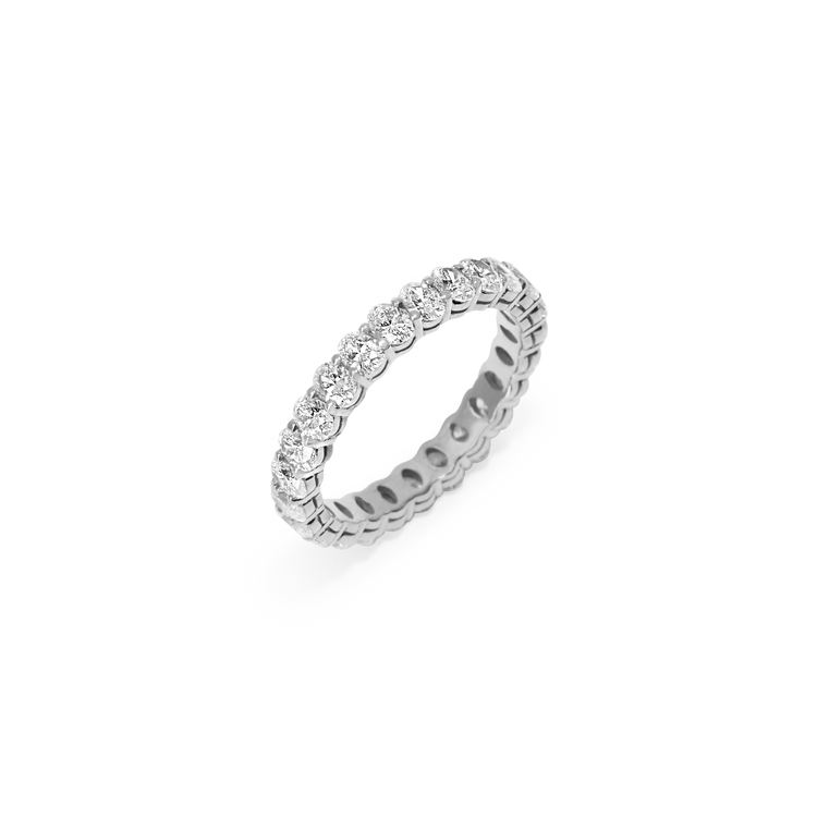 Or & Elle's diamond Sans Cesse Oval eternity band features D color, IF/VVS clarity diamonds held in recycled 18k gold by an elegant scalloped setting. The open-basket in which each oval is set allows for maximum brilliance. Size and color are fully customizable. Available in two carat weights: 2.5 and 5 (based on a U.S. size 7). Total carat weight varies based on ring size.