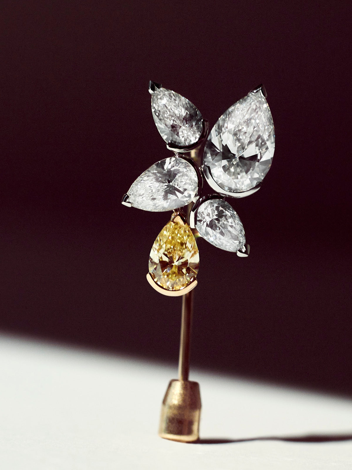 Feuille d’Or Lapel Pin - created for the 2022 Met Gala. This lapel pin features D color, IF/VVS white diamonds as well as a brilliant yellow diamond. All lab-grown.
