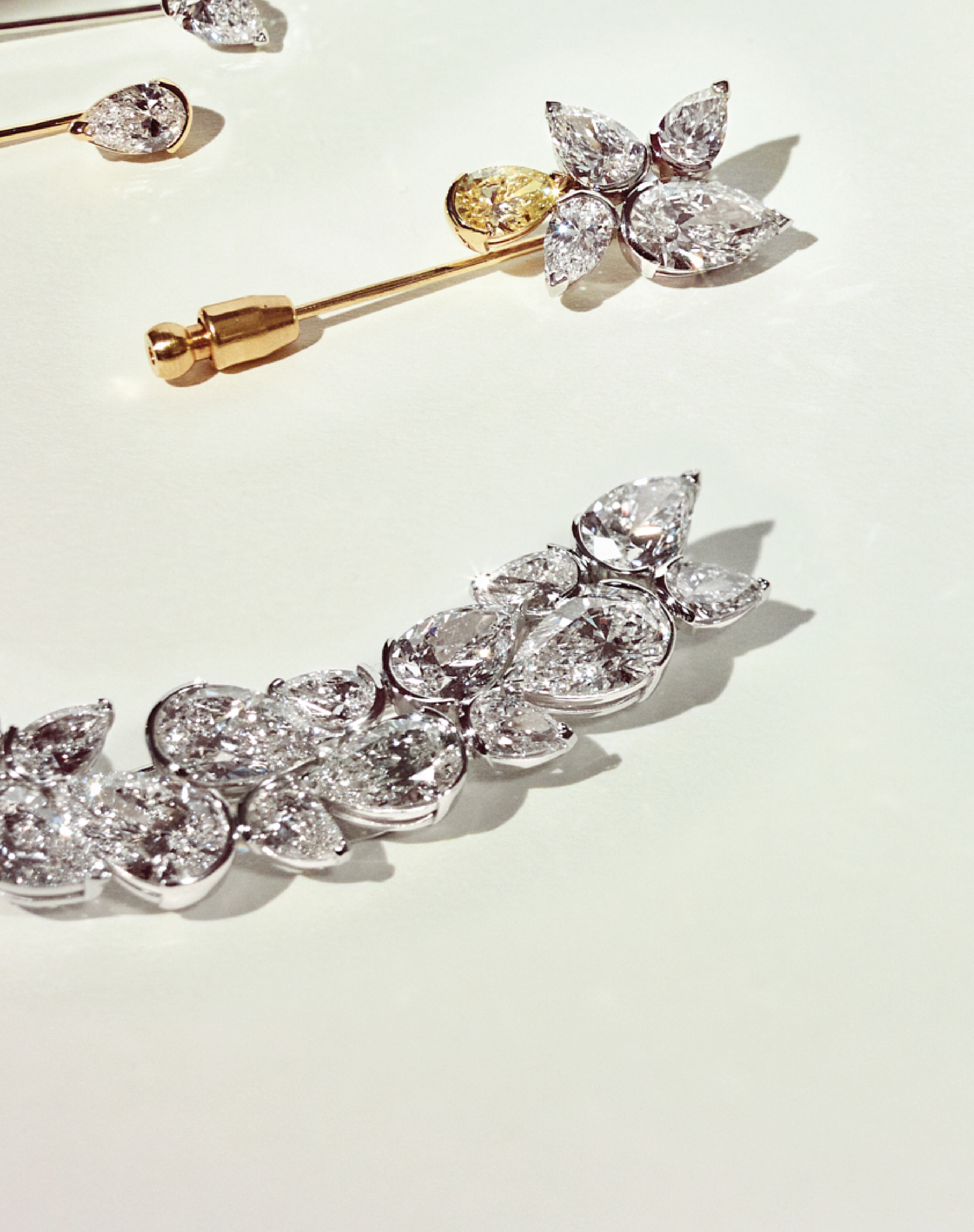 Pete Davidson's pieces from the 2022 Met Gala. Pete wore a custom lapel pin from Or & Elle - the Branche d'Arbre - which was made with pear-shaped diamonds (15 total carat weight), all of which were D color, IF/ VVS clarity. Or & Elle specializes in creating the most iconic custom pieces for all occasions.