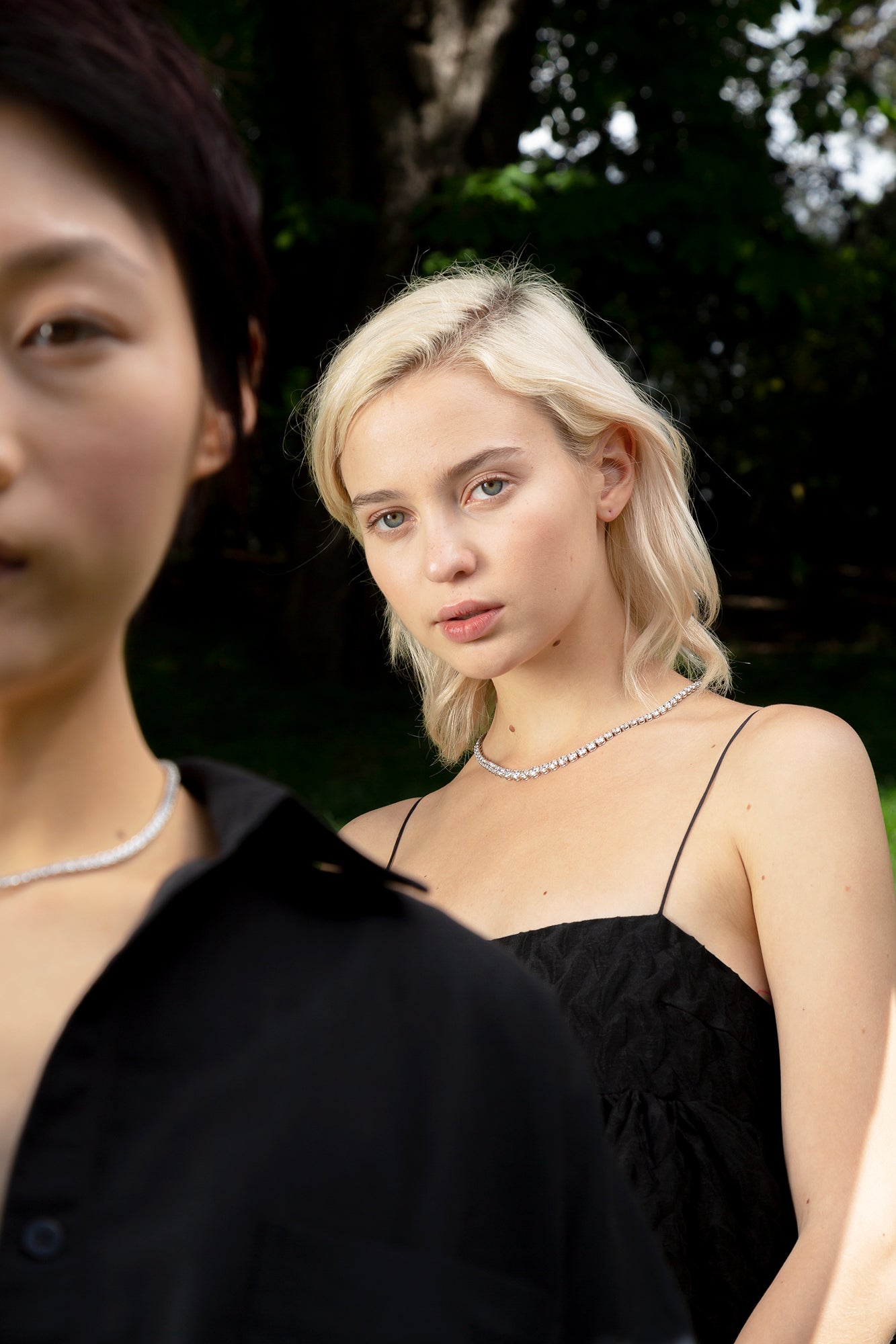 The Colliers - Or & Elle's tennis necklaces are exquisitely made with D color, IF/VVS clarity diamonds. Two models shown here are wearing the Collier Rivière and Collier de Diamants.