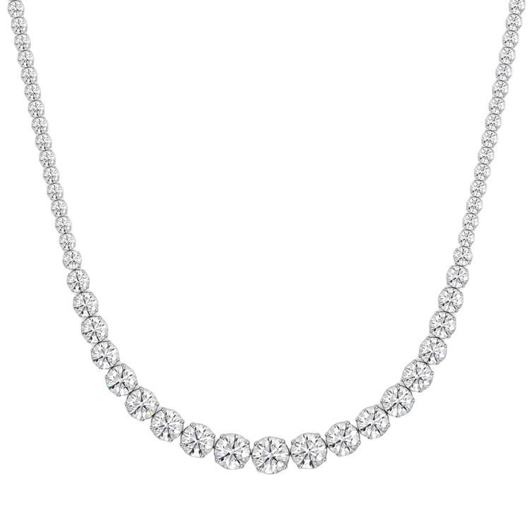 This 25ct graduated diamond tennis necklace features flawless round brilliants in a four prong solitaire setting. Paired here with the Collier de Diamants - our uniform tennis necklace, for the ultimate stack. D-color, IF/VVS diamonds crescendo toward a center diamond of 1ct. The length of this striking piece is 16 inches (40cm).