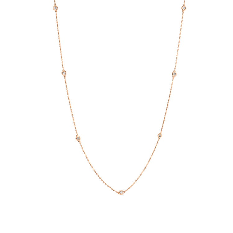 7 bezel-set round brilliants wrap around a 16" (40 cm) chain of recycled 18k Rose Gold totaling 3.8 grams. Reach out to our Atelier to customize.