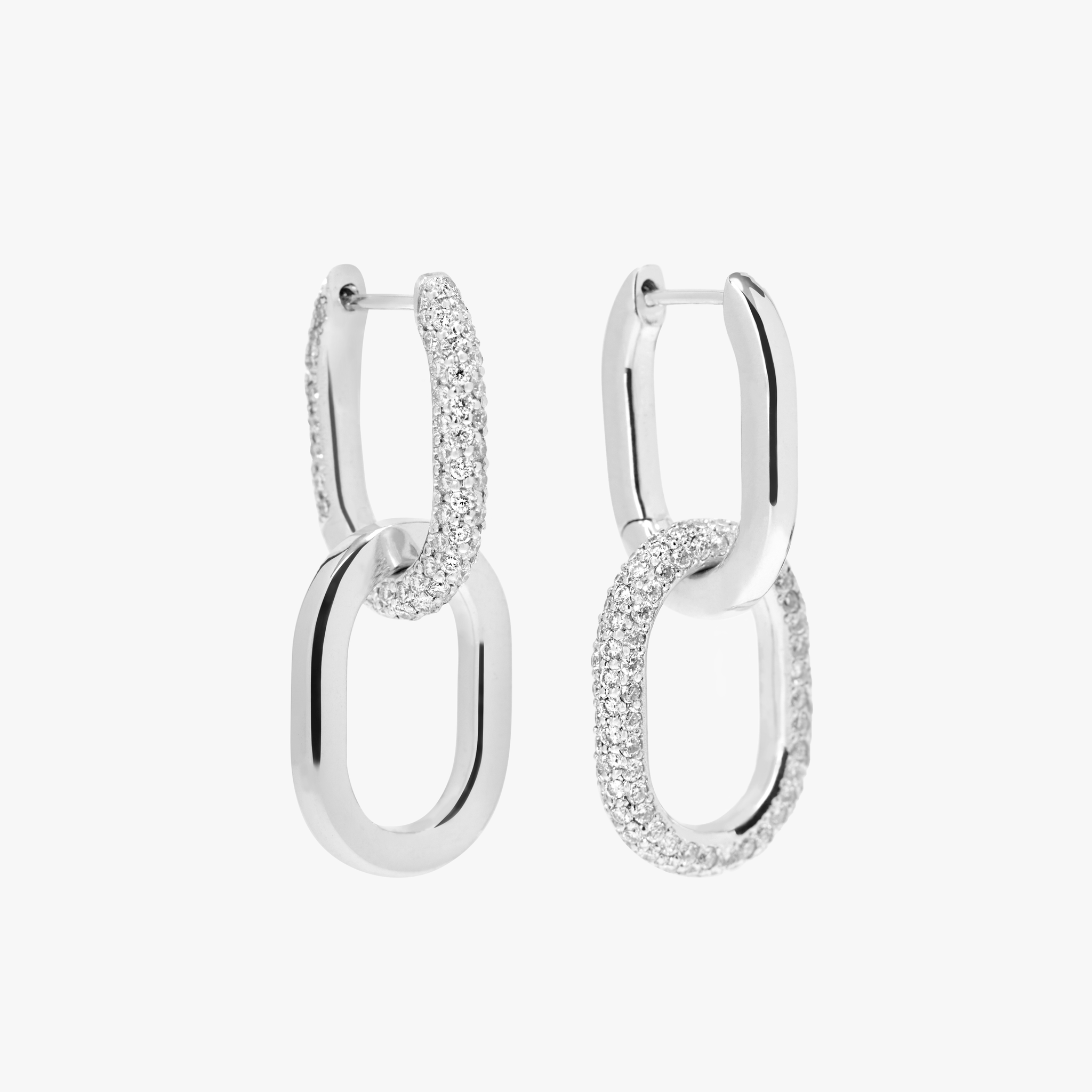 These Ecluse double link earrings focus on modularity - the ability to mix and rearrange for any occasion. The Dalliance Ecluse Earrings feature over 10 grams of 18k gold and 1.15 total carat weight of diamonds. Earrings are sold as a pair, with complementary diamond / gold links. White Gold shown here. 