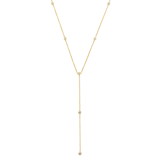 9 bezel-set round brilliants wrap around a drop chain lariat of recycled 18K gold. The collar of the necklace measures 16 inches (40cm); the length of the drop is 4 inches (10cm). To customize, please write to our Atelier.