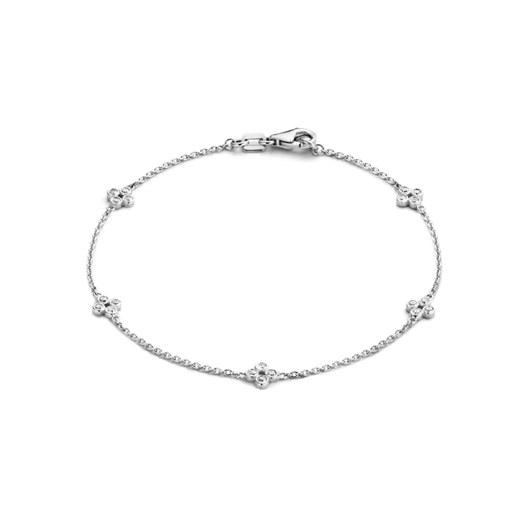 This delicate bracelet has 20 D color, IF/VVS clarity round brilliant diamonds that form sweet floral motifs around the wrist in 18k recycled gold. This bracelet can be adjusted to two different lengths, 6.3" (16 cm) and 6.7" (17 cm). Shown here in White Gold.