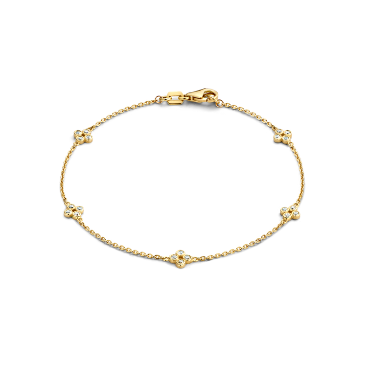 This delicate bracelet has 20 D color, IF/VVS clarity round brilliant diamonds that form sweet floral motifs around the wrist in 18k recycled gold. This bracelet can be adjusted to two different lengths, 6.3" (16 cm) and 6.7" (17 cm). Shown here in 18K Yellow Gold.