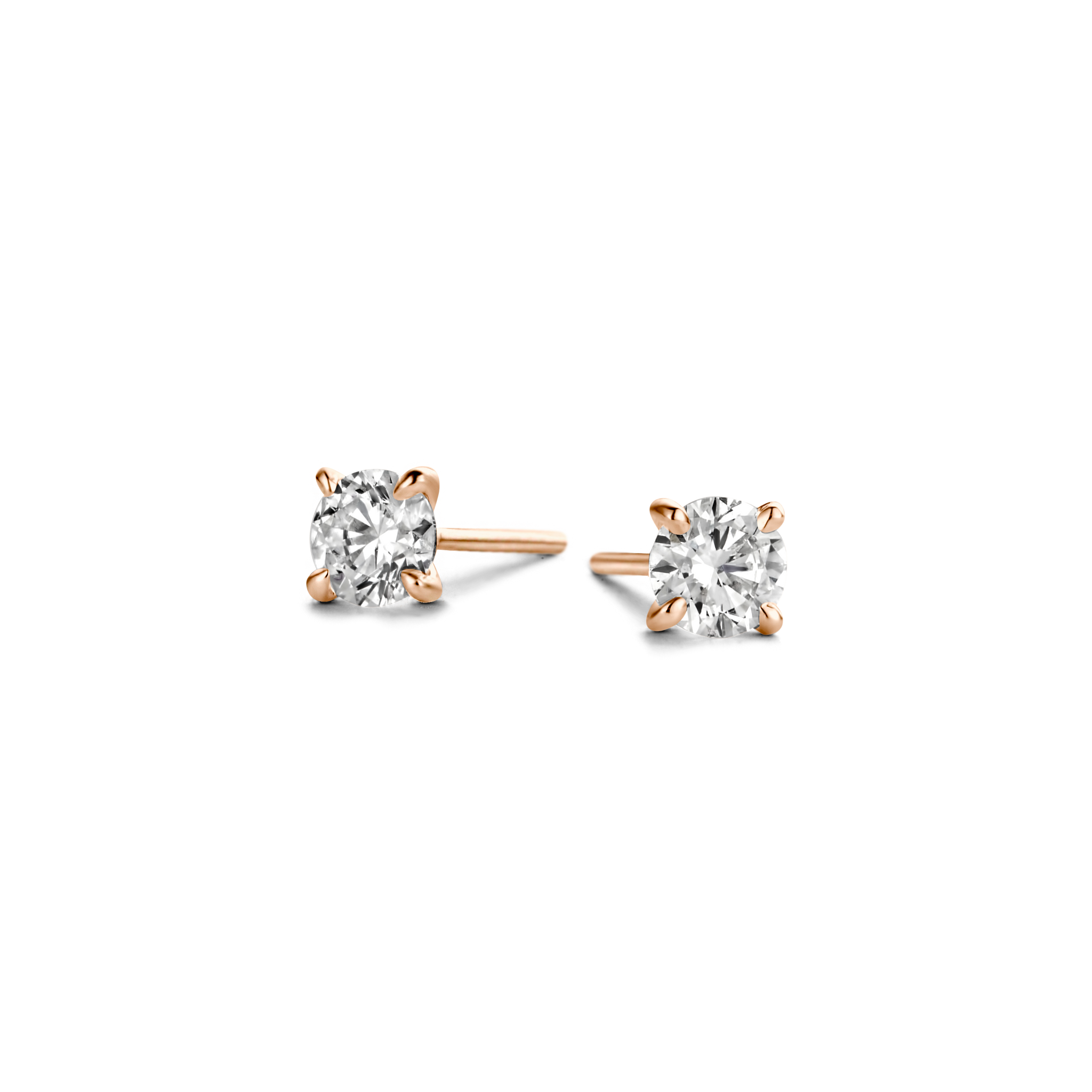 Polished 18k gold is illuminated by a solitaire D color, IF/VVS diamond, the unparalleled quality of which is on full display in a 4-prong setting. Sold as a pair; diamond carat weight refers to the total in the pair of studs. Rose Gold shown here.