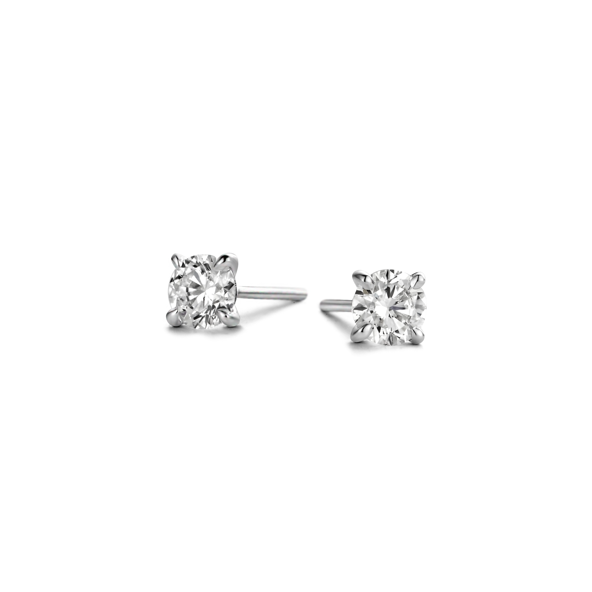 Polished 18k gold is illuminated by a solitaire D color, IF/VVS diamond, the unparalleled quality of which is on full display in a 4-prong setting. Sold as a pair; diamond carat weight refers to the total in the pair of studs. White Gold shown here.