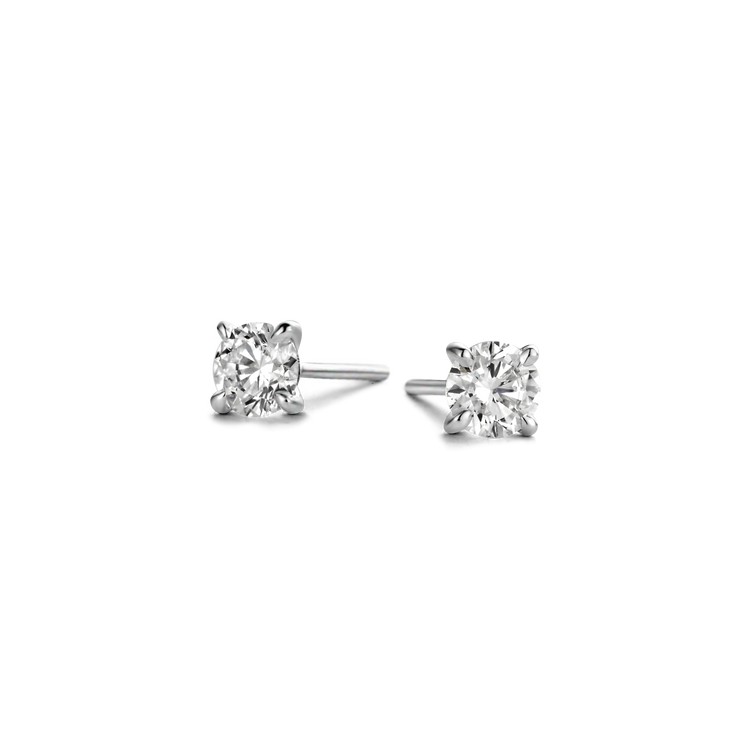 Polished 18k gold is illuminated by a solitaire D color, IF/VVS diamond, the unparalleled quality of which is on full display in a 4-prong setting. Sold as a pair; diamond carat weight refers to the total in the pair of studs. White Gold shown here.