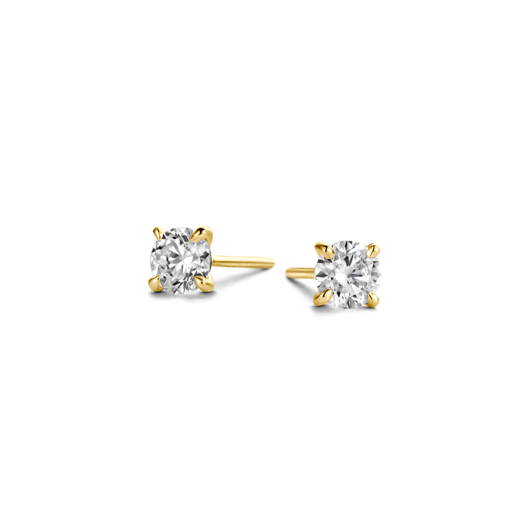 Polished 18k gold is illuminated by a solitaire D color, IF/VVS diamond, the unparalleled quality of which is on full display in a 4-prong setting. Sold as a pair; diamond carat weight refers to the total in the pair of studs. Yellow Gold shown here.