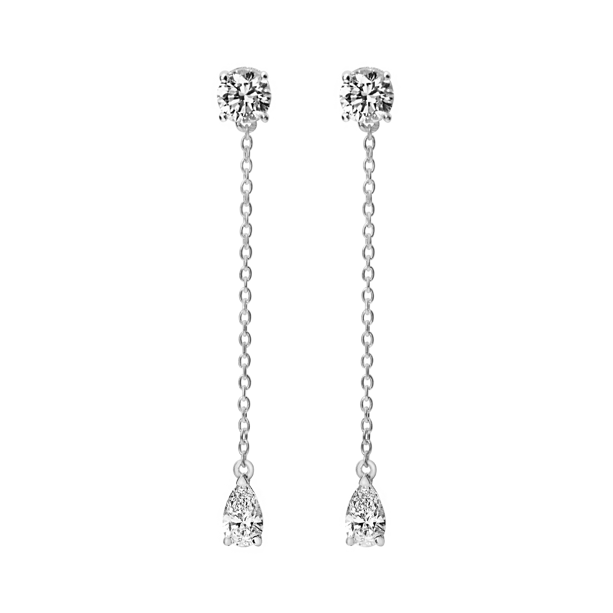 Full of movement, these hanging diamond earrings are strung with a round and pear diamond totaling 0.8 carat and separated by 1 inch of recycled 18k gold. Pair with other pieces in the Lariat collection, Lariat Trois, and the Lariat Necklace. Shown in White Gold here. Sold as a pair.