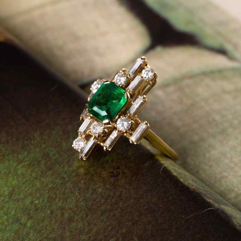 Inspired by the Art Deco period, this inimitable cocktail ring - the Nina - bespeaks the multilayered, dynamic, and playful era. Baguette and round diamonds are set in multidimensional space around an heirloom 2 carat Emerald. Connect with our Atelier's design experts to make yours to order and to customize the size, color, and gem of the center stone.
