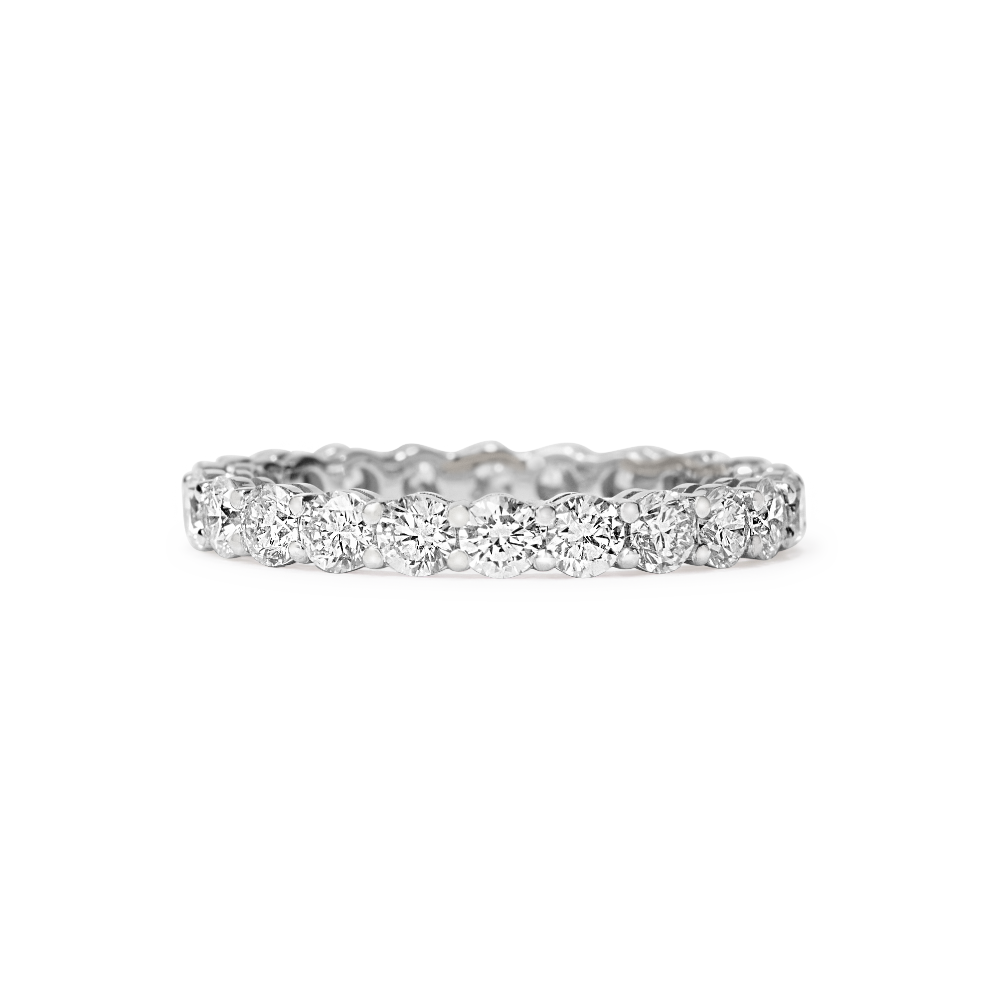 Or & Elle's Sans Cesse Round diamond eternity band features D color, IF/VVS clarity round brilliants held in recycled 18k gold by an elegant scalloped setting. Size and color are fully customizable. White gold shown here. Available in two carat weights: 2.5 and 5 (based on a U.S. size 7).